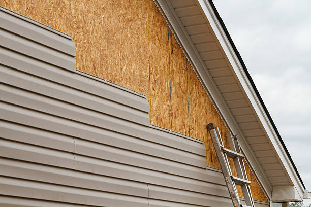 Professional Siding Contractor technician working in Mill Run, PA